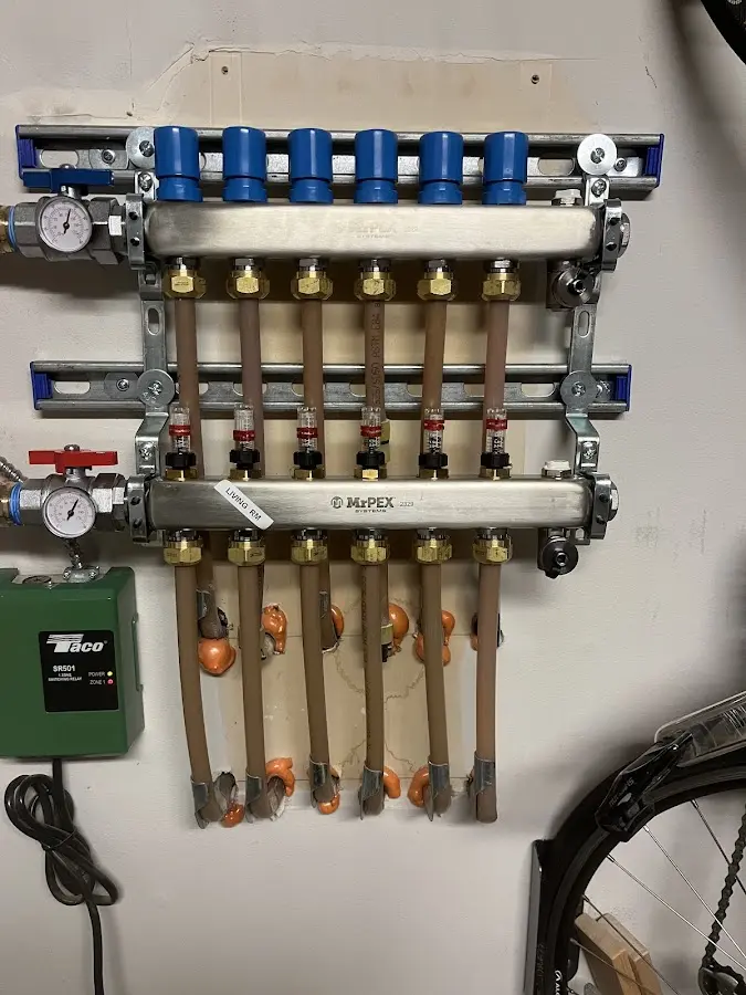 Plumber performing Gas Line Installation at a residential property in Republic